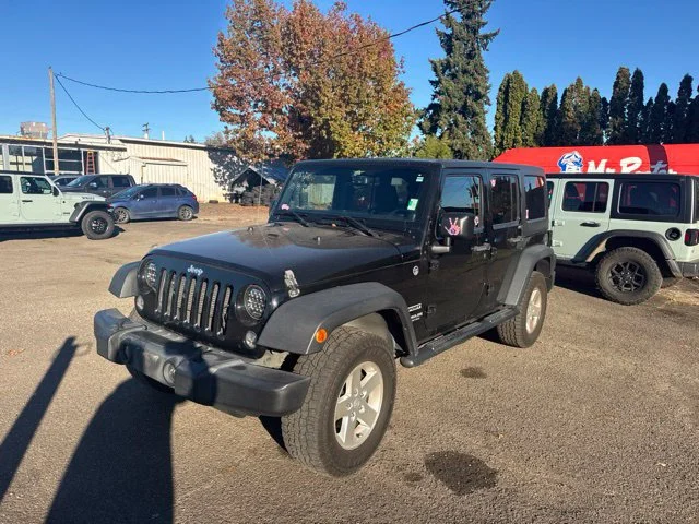 Used 2014 Black Clearcoat Jeep Sport image 2