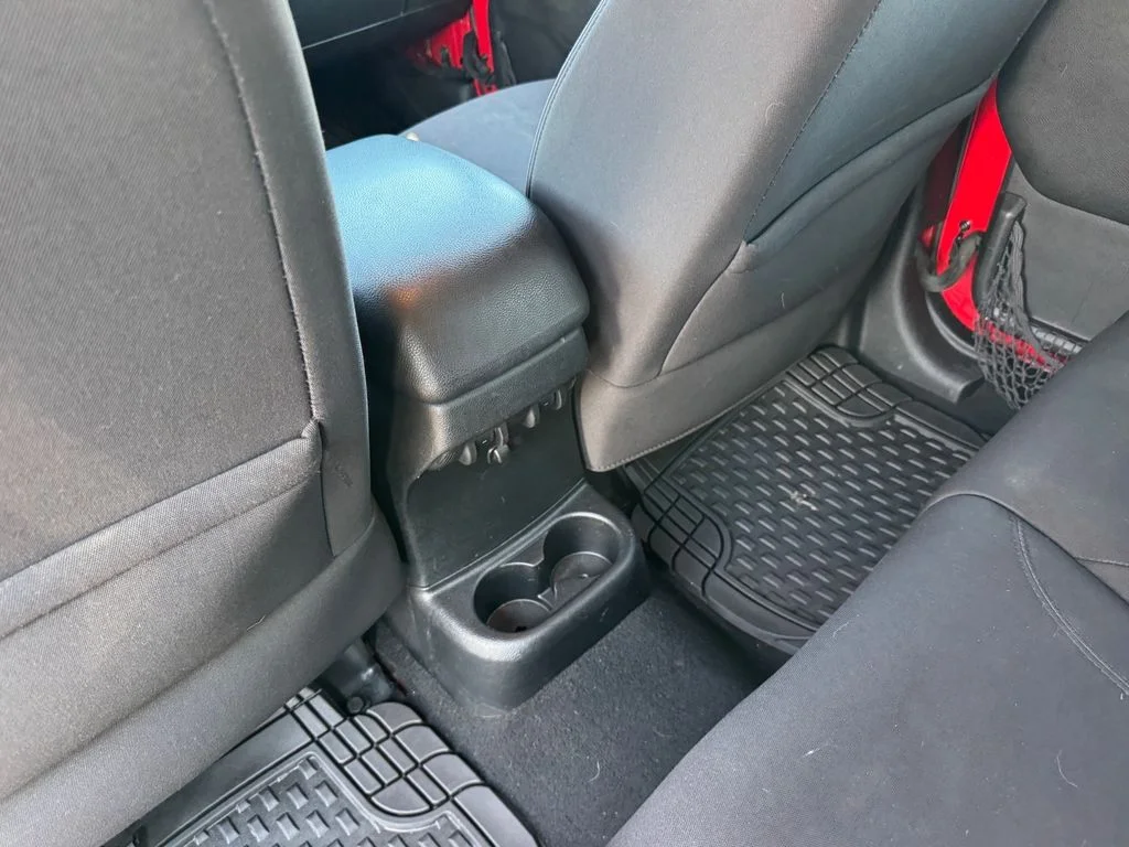 Used 2014 Red Jeep Unlimited Sport image 12