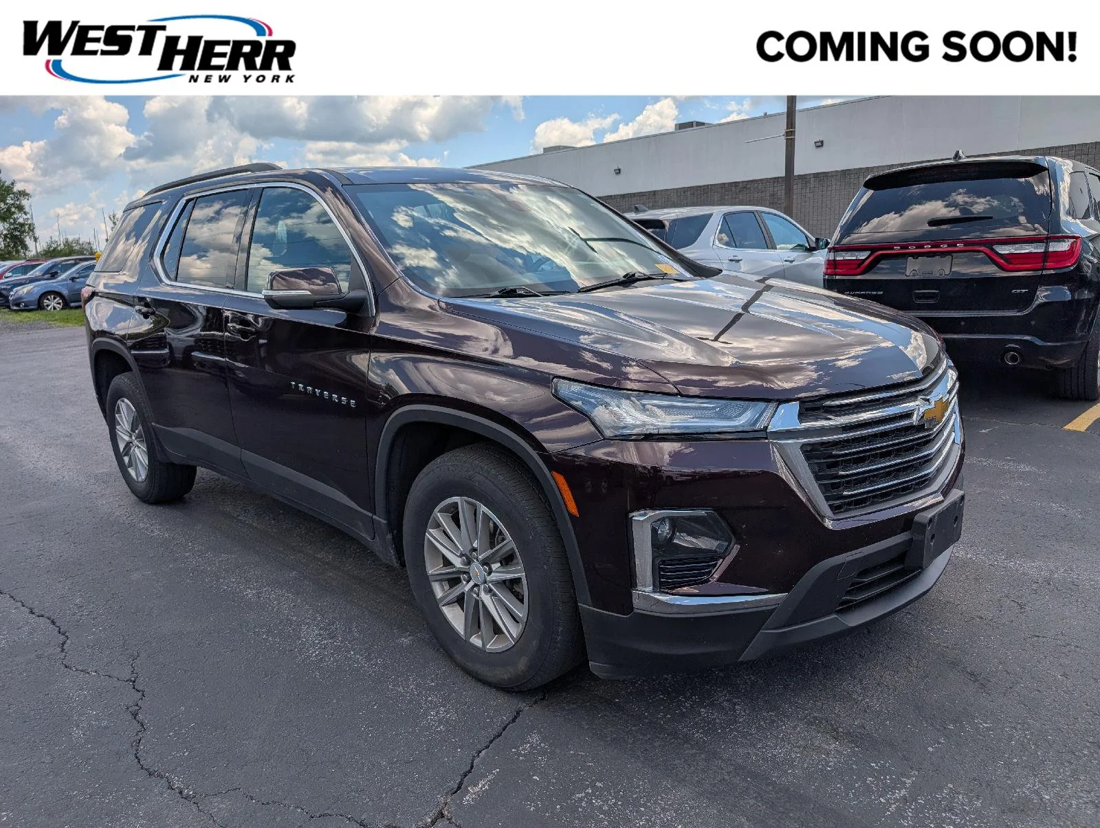 Used 2023 BLACK CHERRY METALLIC Chevrolet LT Cloth image 1