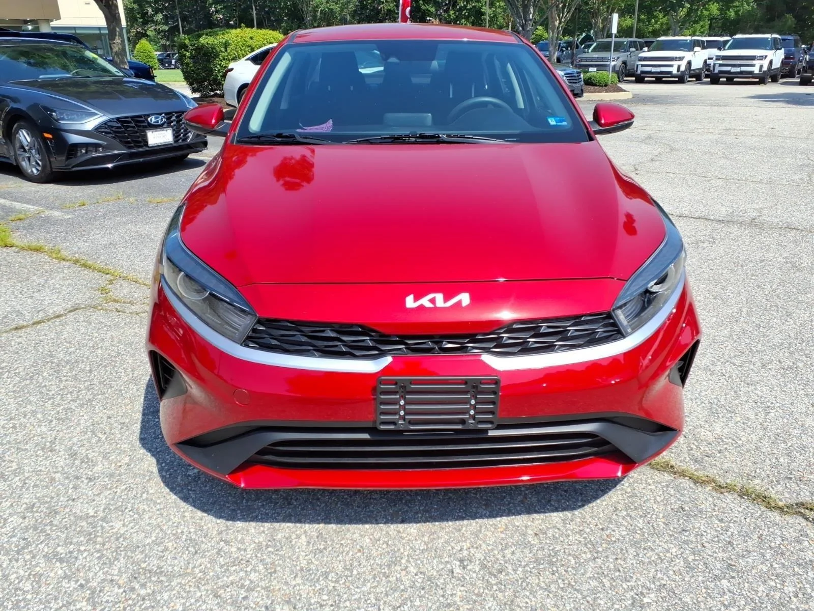 Used 2023 Currant Red Kia LXS image 2