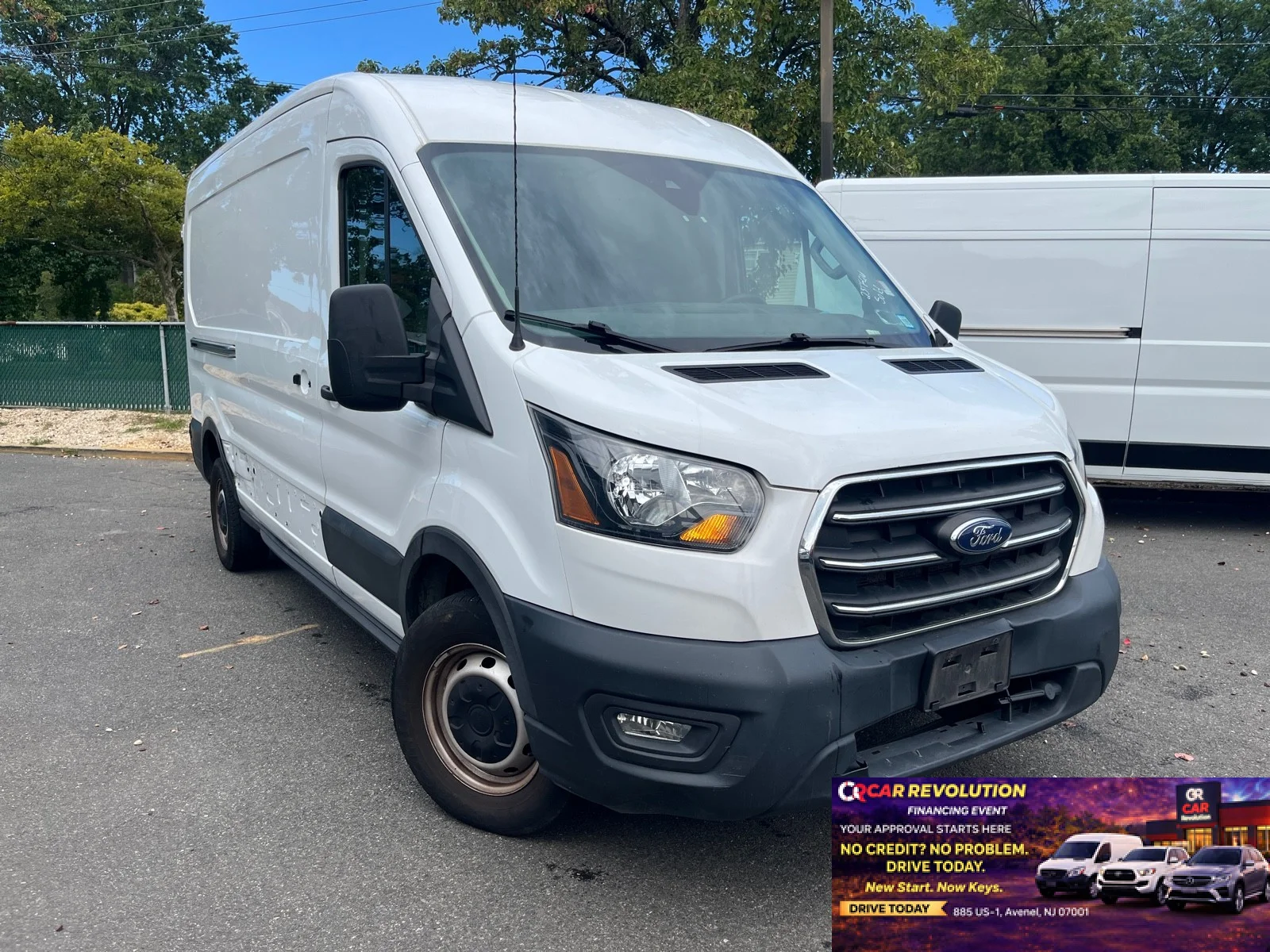 Used 2020 Oxford White Ford T250 MED ROOF image 1