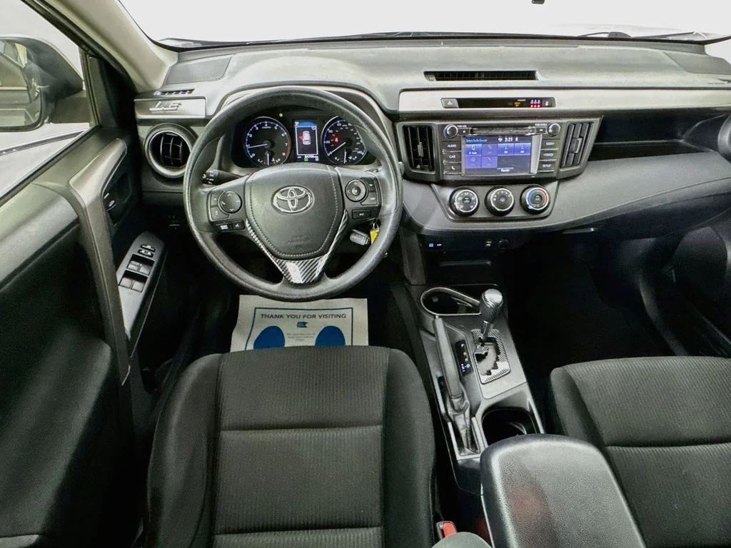 Used 2018 Magnetic Gray Metallic Toyota LE image 26