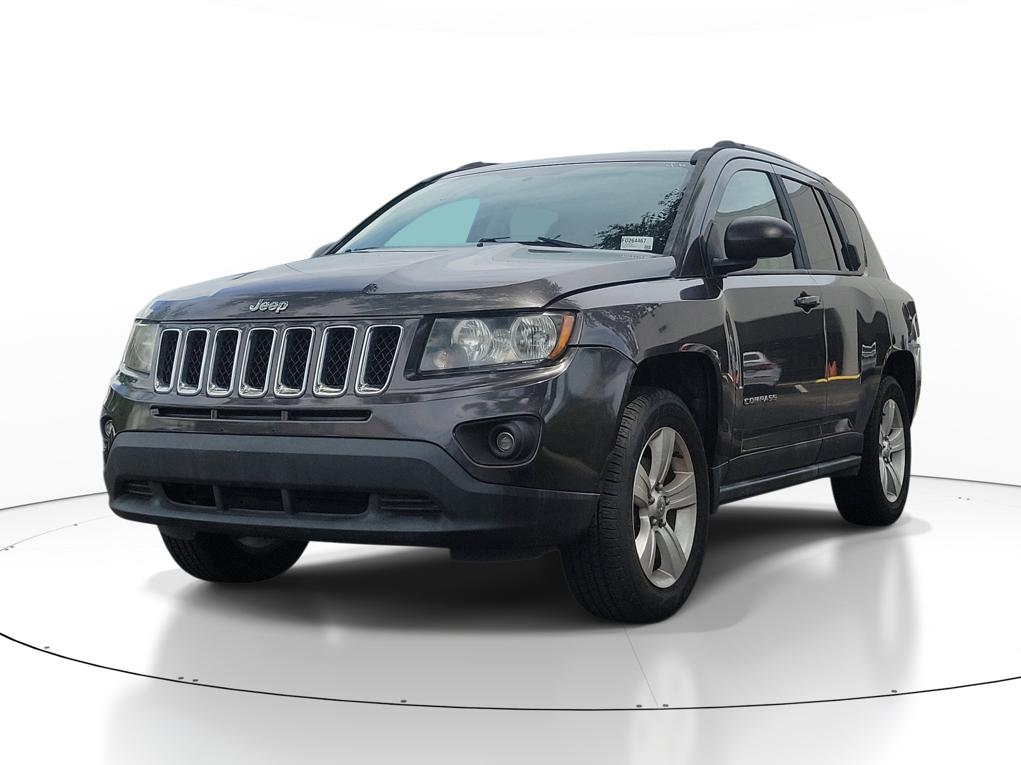 Used 2015 Granite Crystal Metallic Clearcoat Jeep Sport image 3