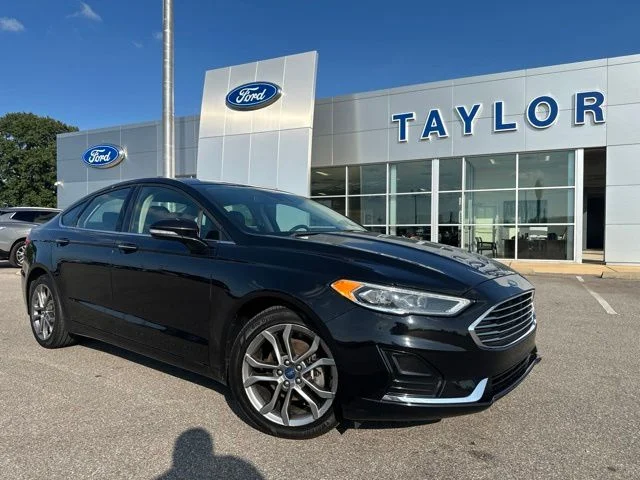 Used 2020 Agate Black Metallic Ford SEL image 1