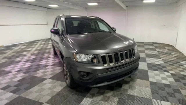 Used 2016 Gray Jeep Sport image 2