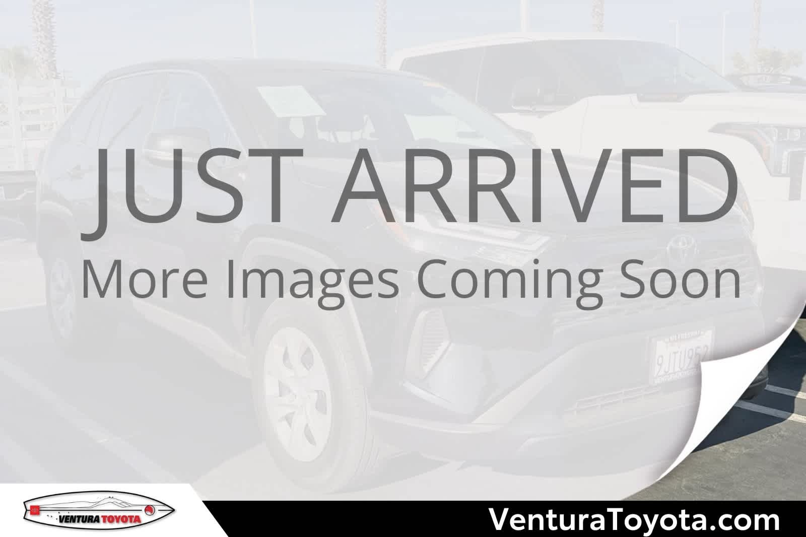 Used 2023 Midnight Black Metallic Toyota LE image 1