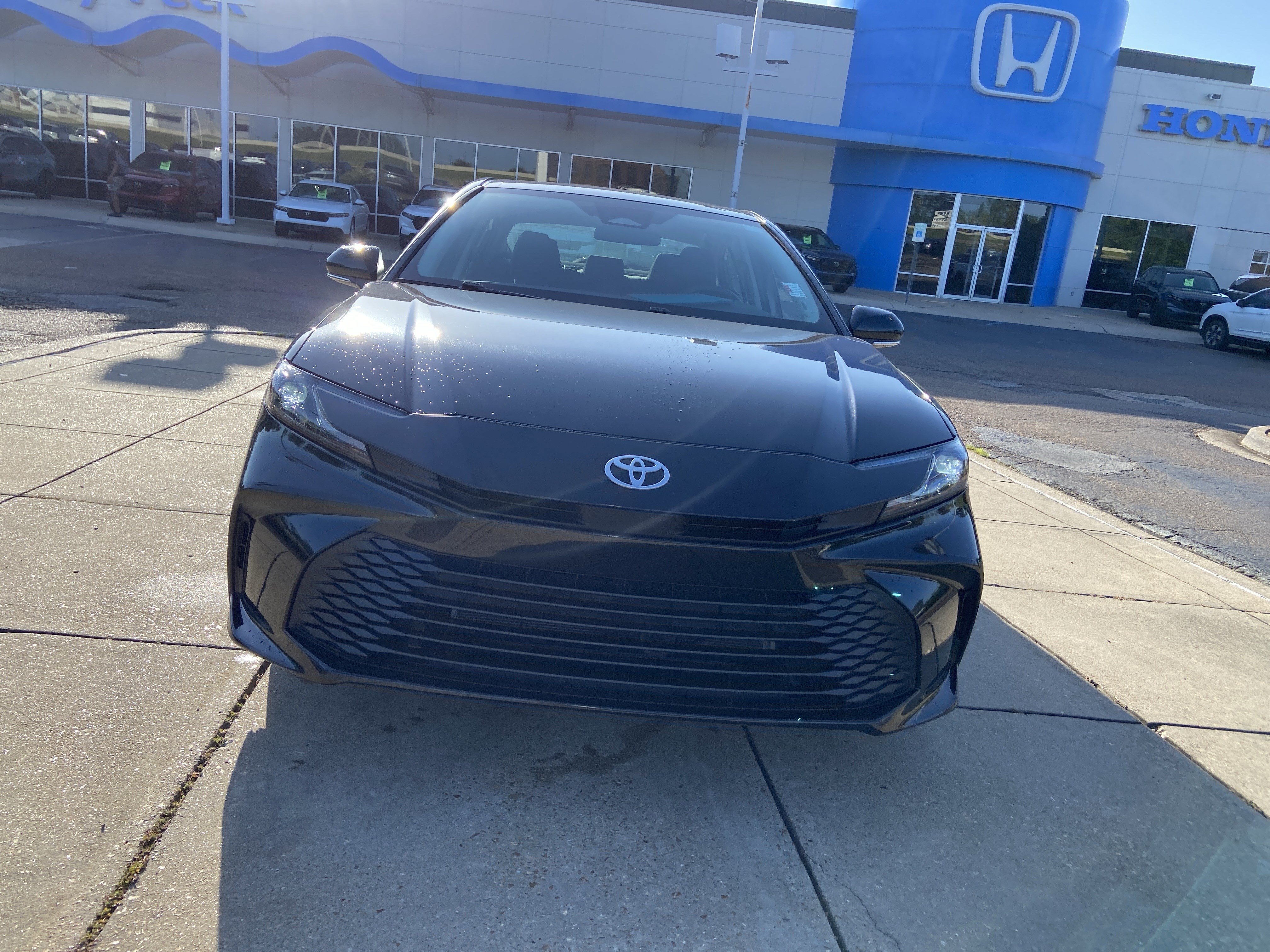Used 2025 Midnight Black Metallic Toyota LE image 3