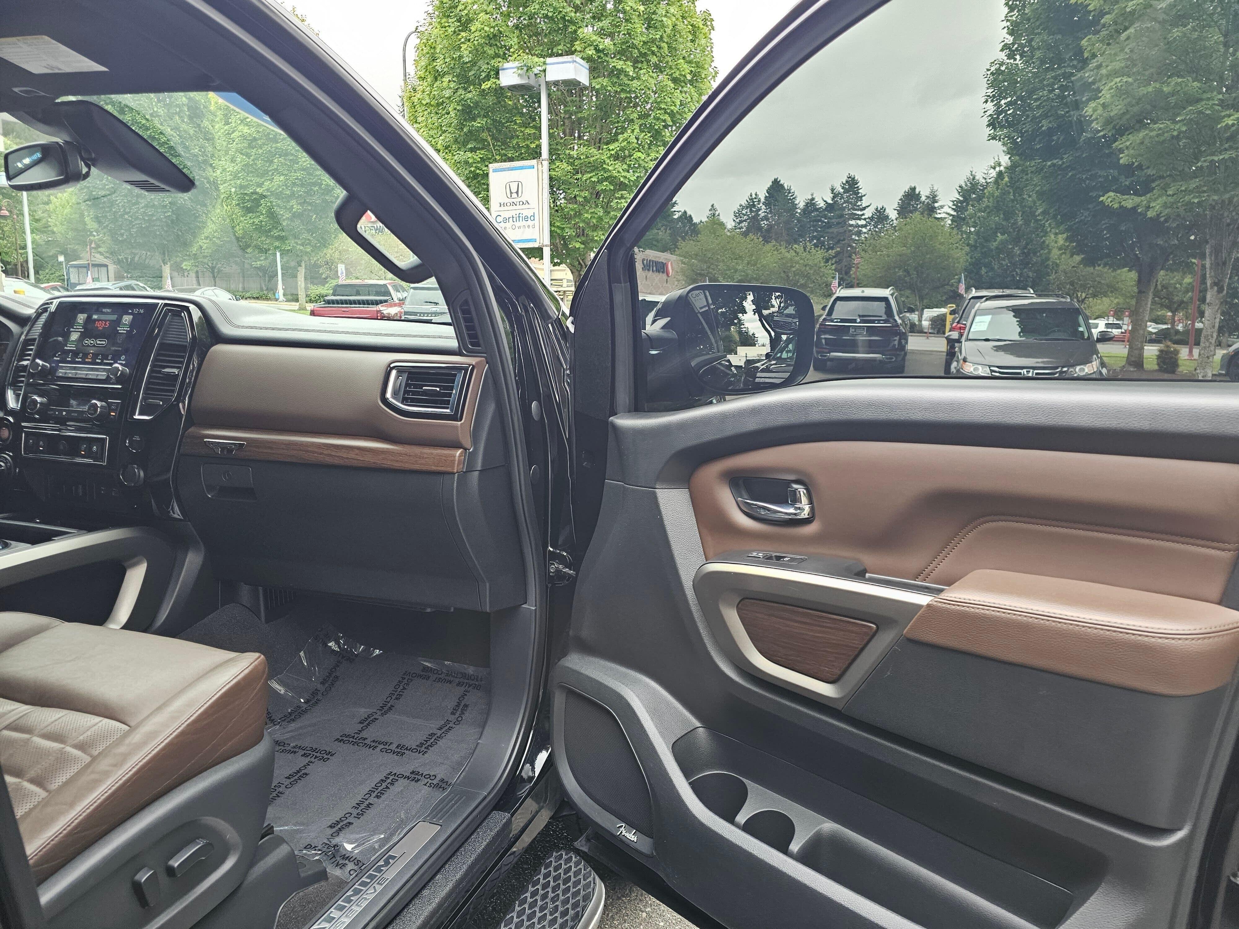 Used 2021 Super Black Nissan Platinum Reserve image 11