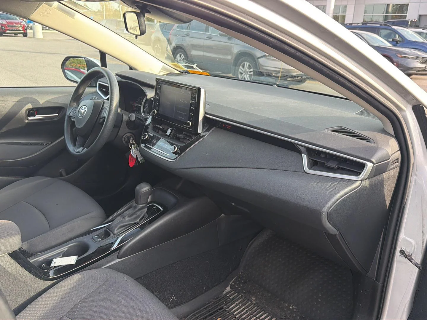 Used 2021 Classic Silver Metallic Toyota LE image 17