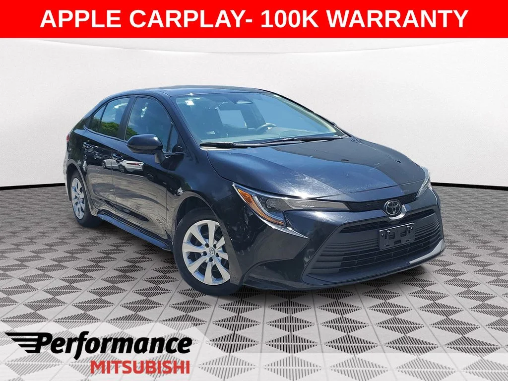 Used 2023 Black Toyota LE image 1