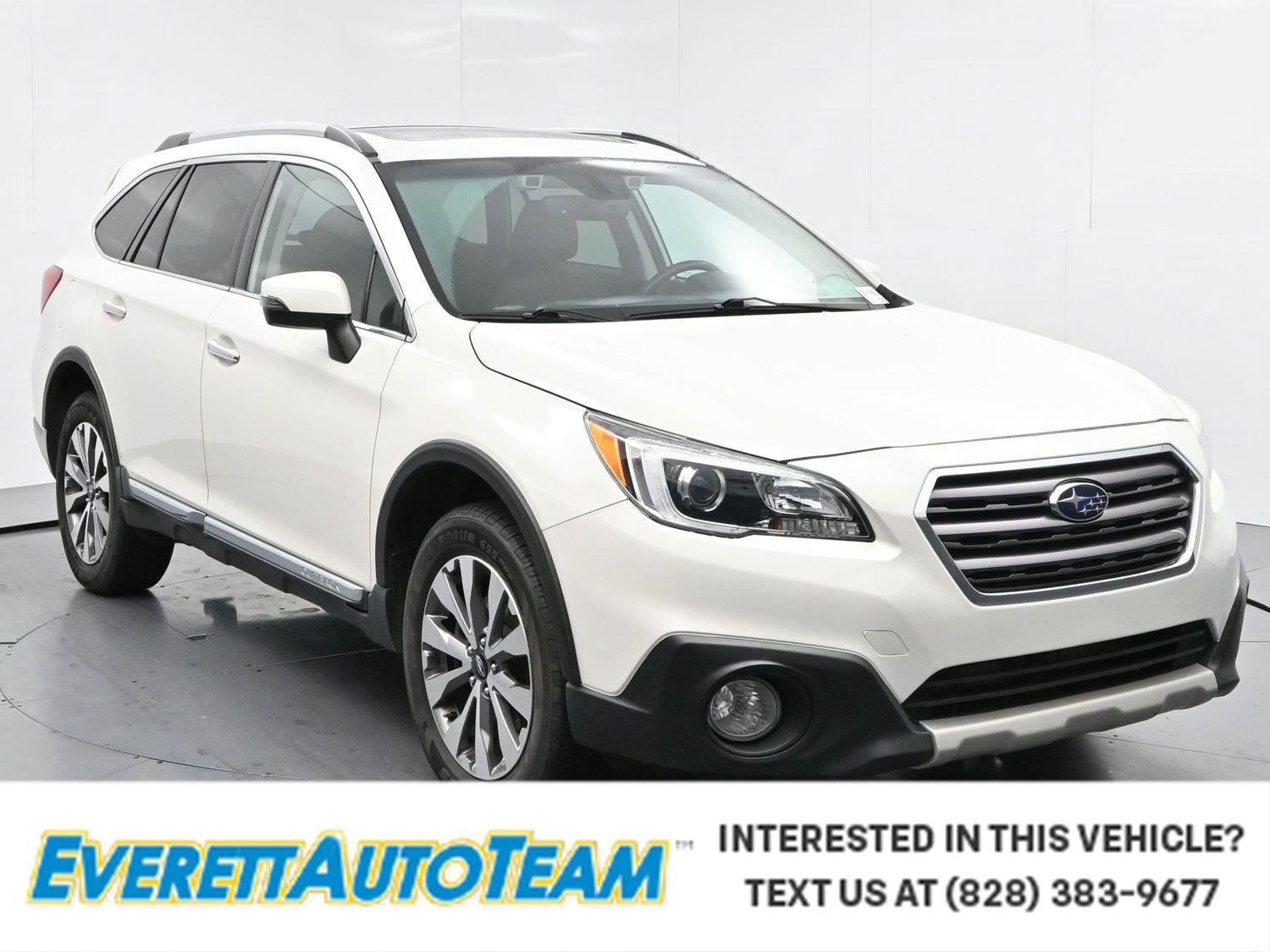 Used 2017 Crystal White Pearl Subaru Touring image 1