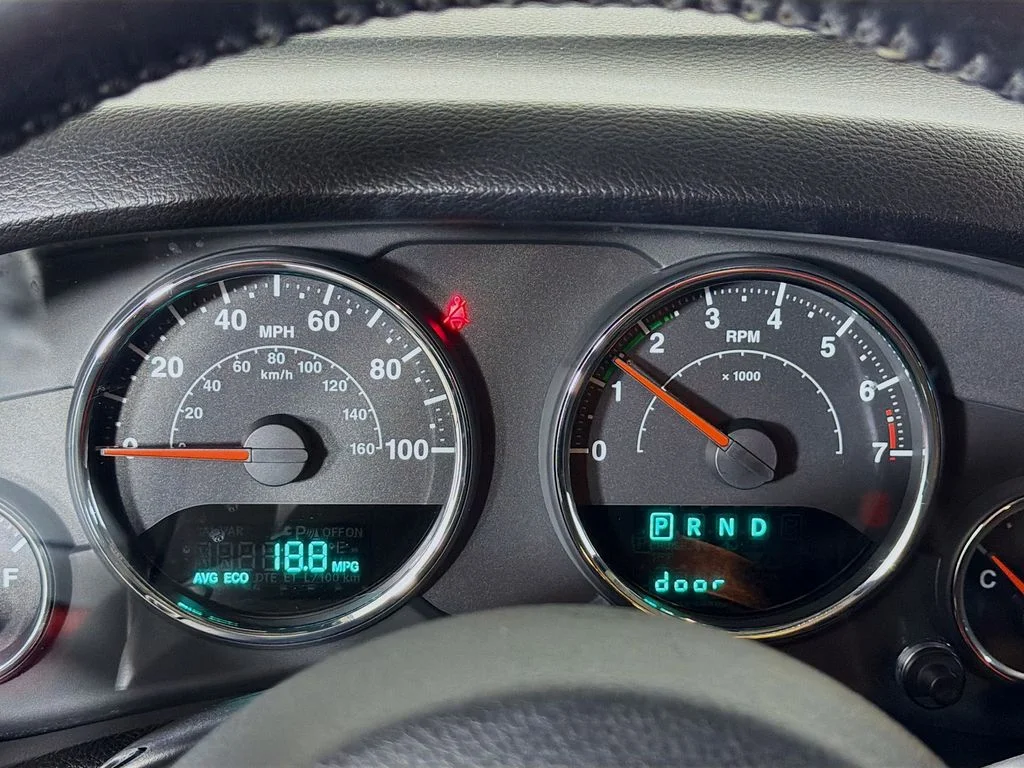 Used 2015 Black Jeep Unlimited Sahara image 13