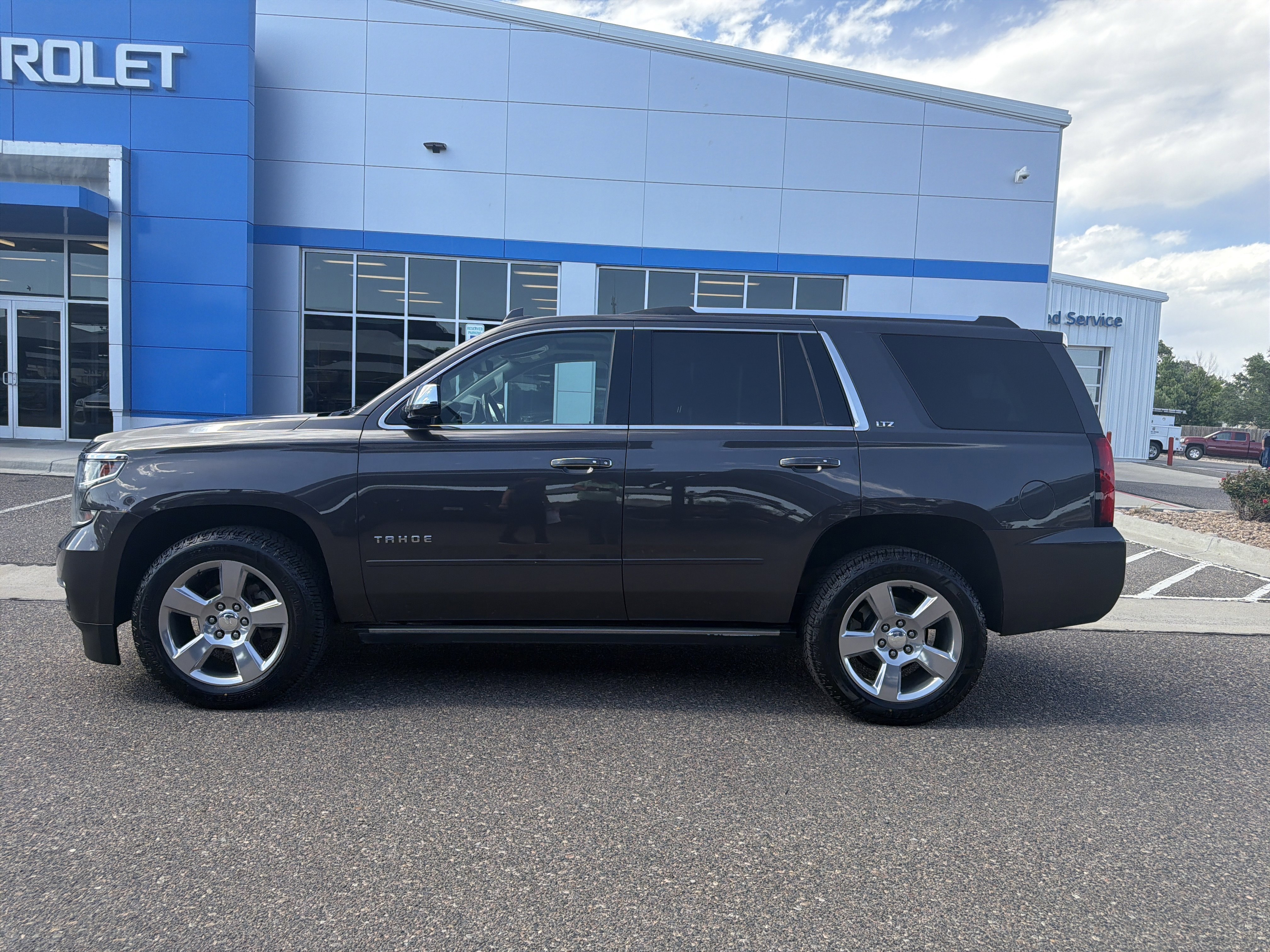 Used 2016 Chevrolet Tahoe LTZ with VIN 1GNSKCKC0GR184851 for sale in Sterling, CO