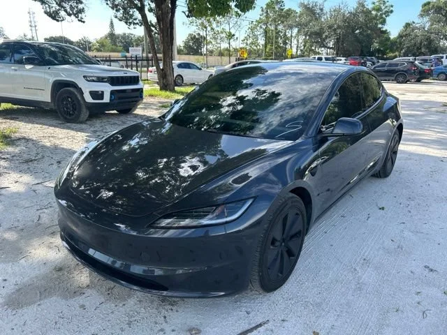 Used 2024 Stealth Gray Tesla Base image 2