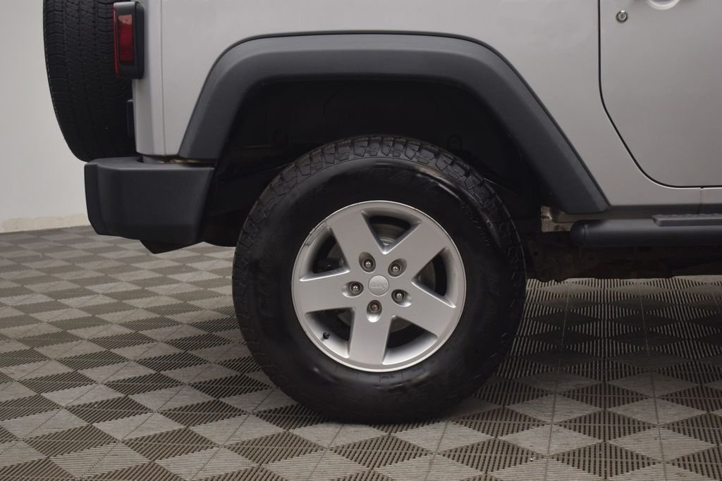 Used 2012 Bright Silver Metallic Clearcoat Jeep Sport image 21
