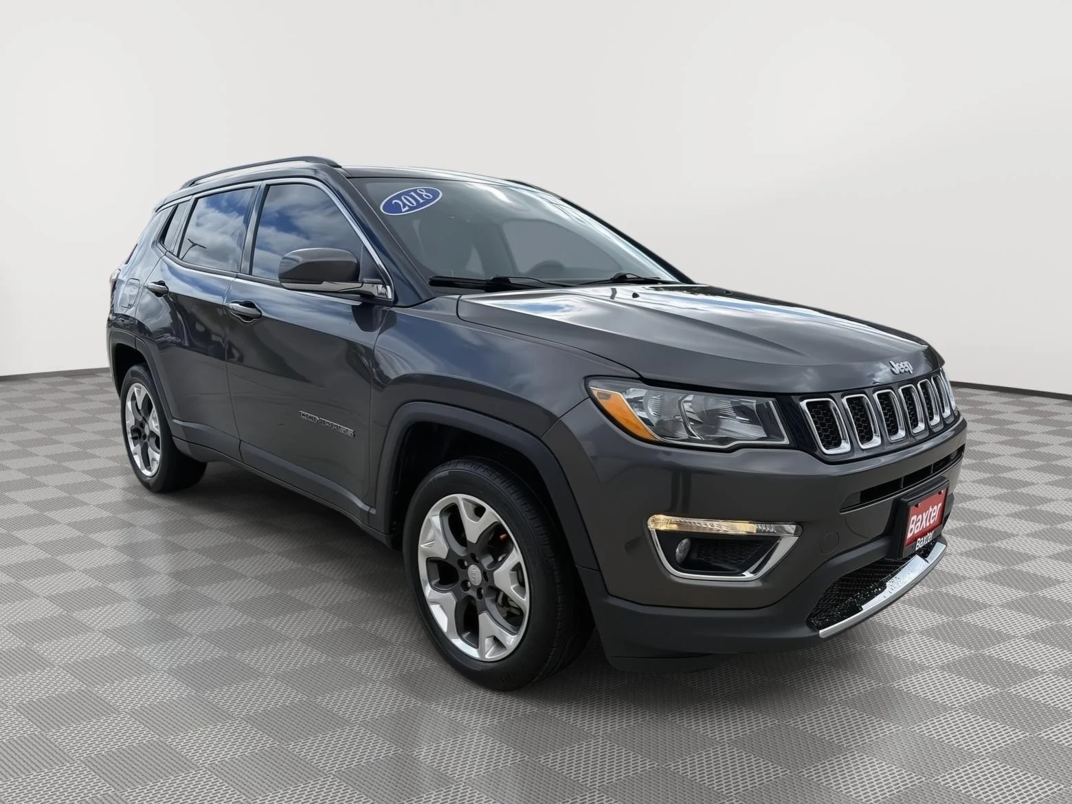 Used 2018 Granite Crystal Metallic Clearcoat Jeep Limited image 1