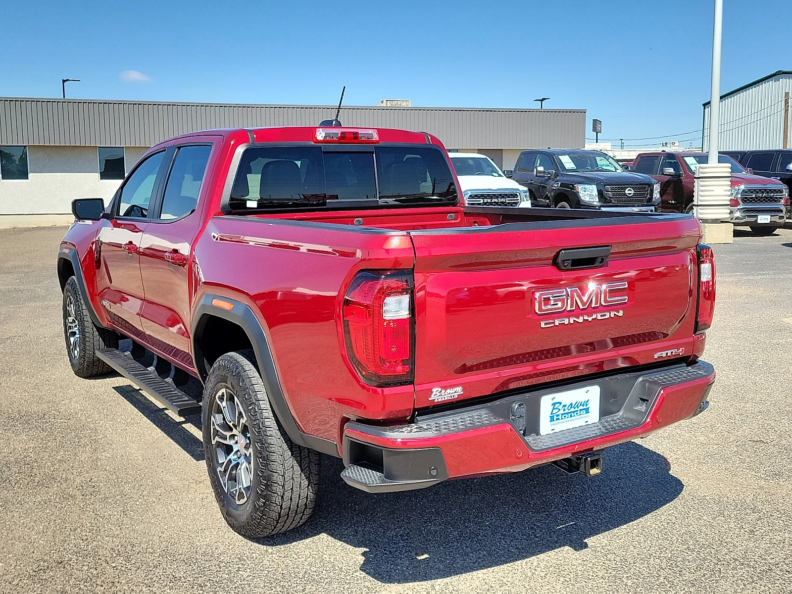 Certified Used 2024 Volcanic Red GMC 4WD AT4 image 7