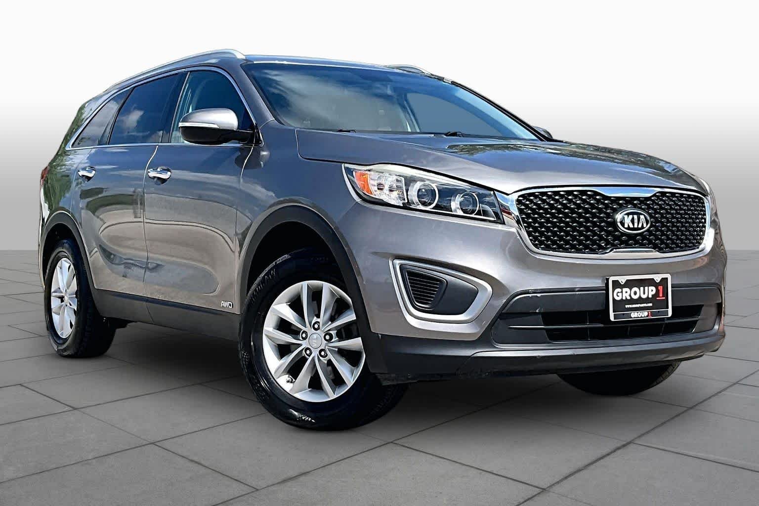 Used 2016 Titanium Silver Kia LX image 3