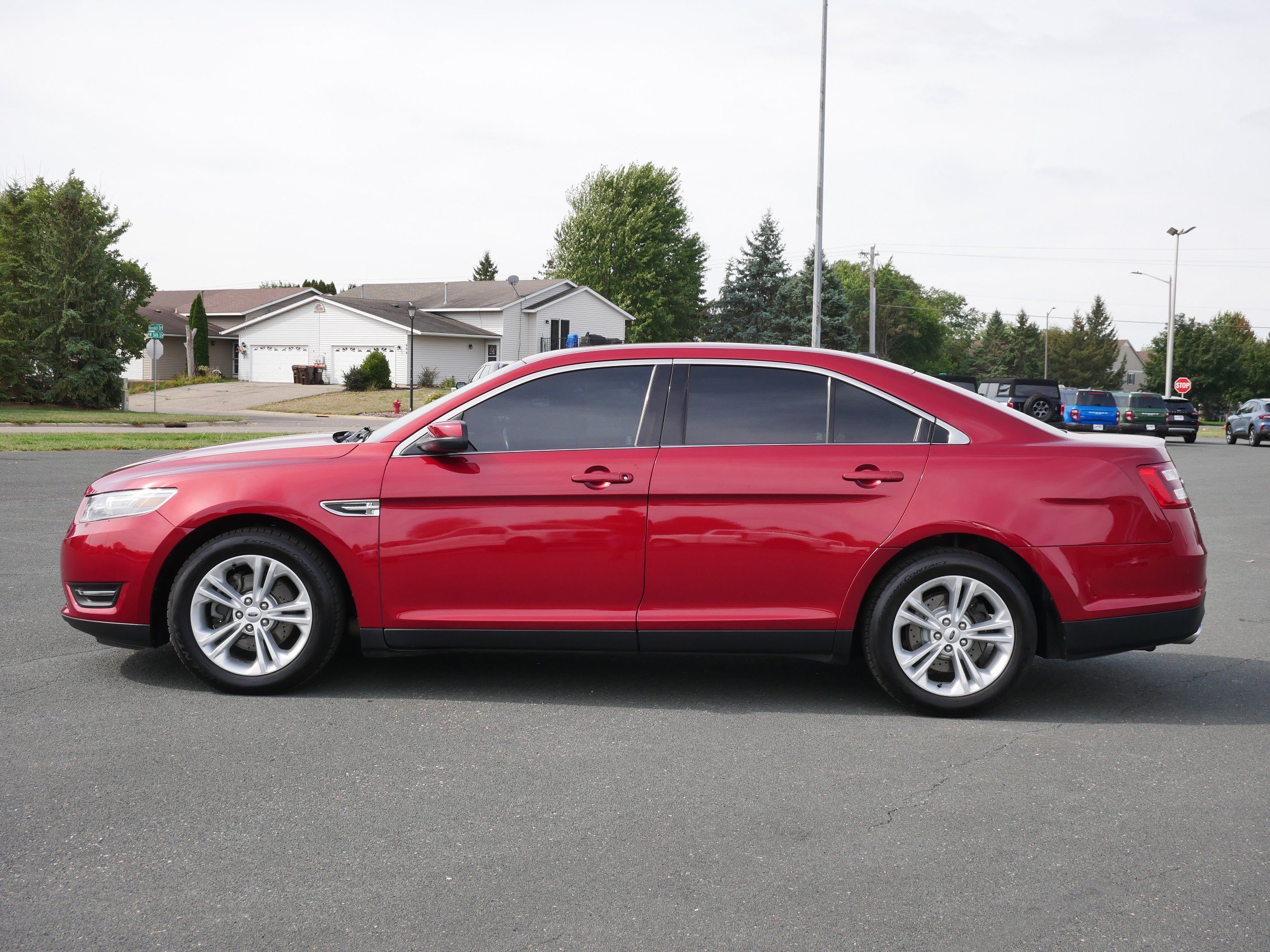 Used 2013 Ford Taurus SEL with VIN 1FAHP2E85DG216809 for sale in Hastings, Minnesota