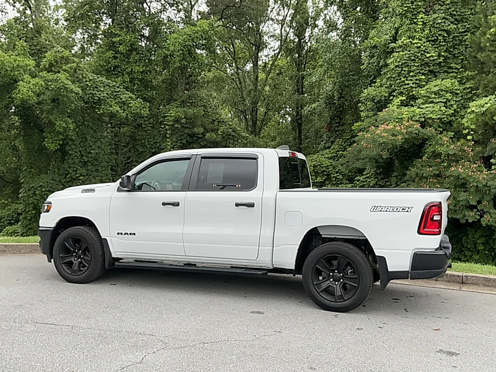 Used 2025 Bright White Clearcoat Ram Warlock Crew Cab 4x4 5