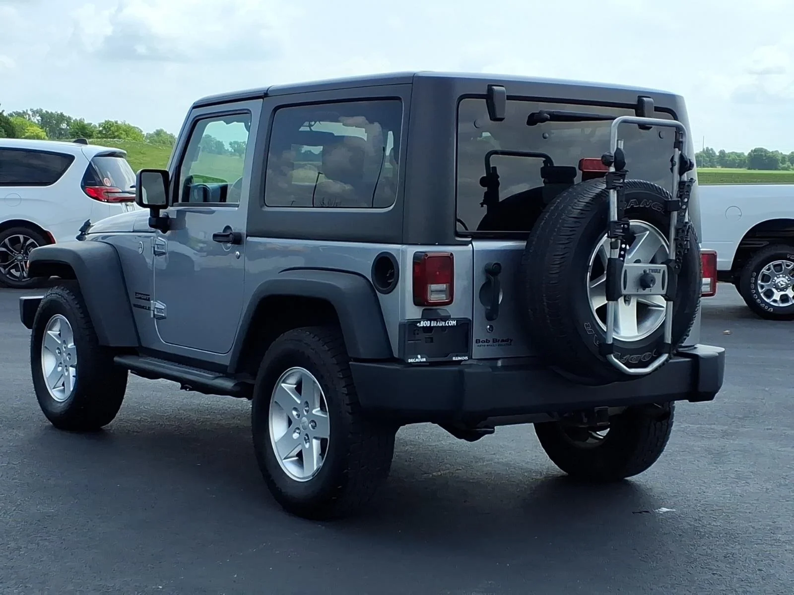 Used 2013 Billet Silver Metallic Clear Coat Jeep Sport image 10