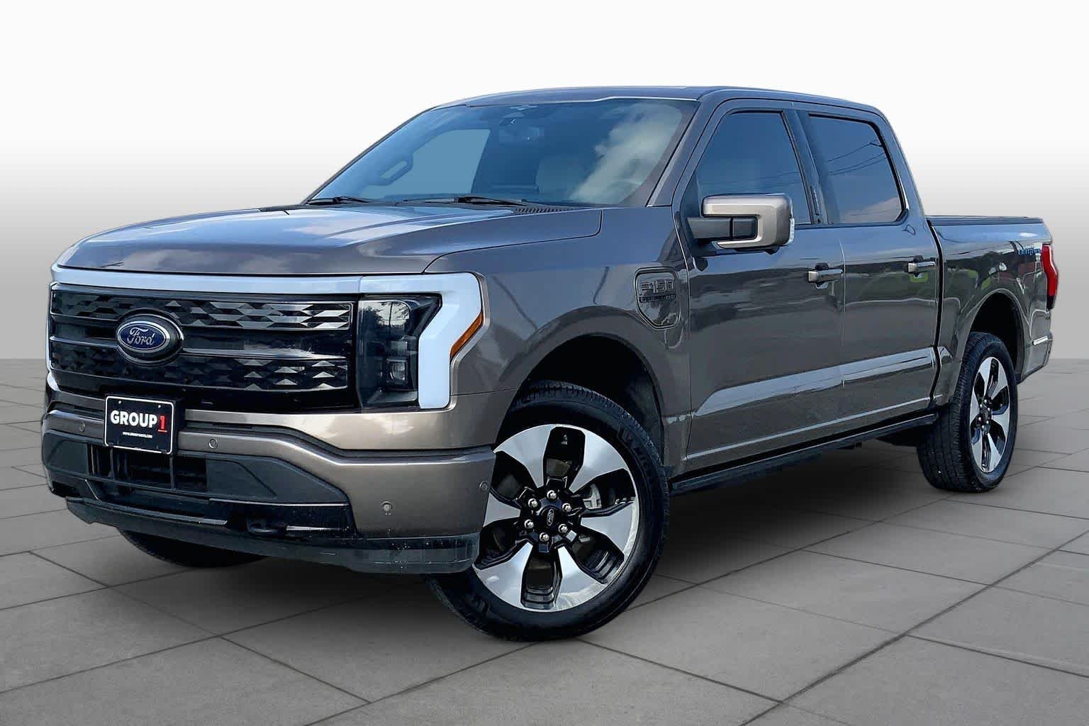Used 2023 Stone Gray Ford Platinum image 2