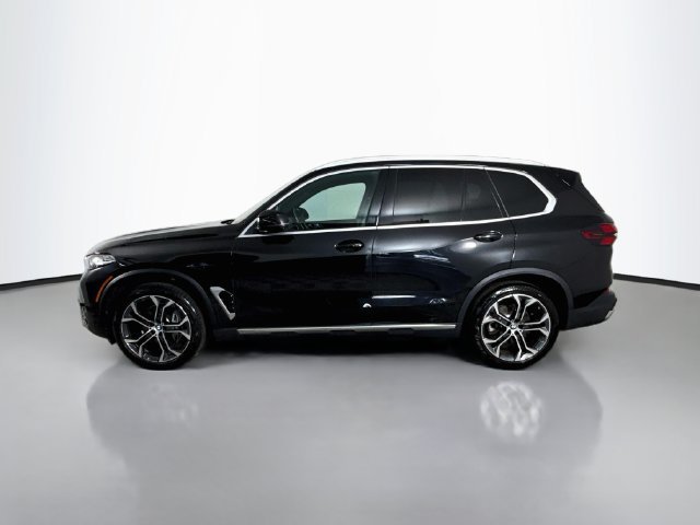 Used 2024 Black Sapphire Metallic BMW sDrive40i image 4