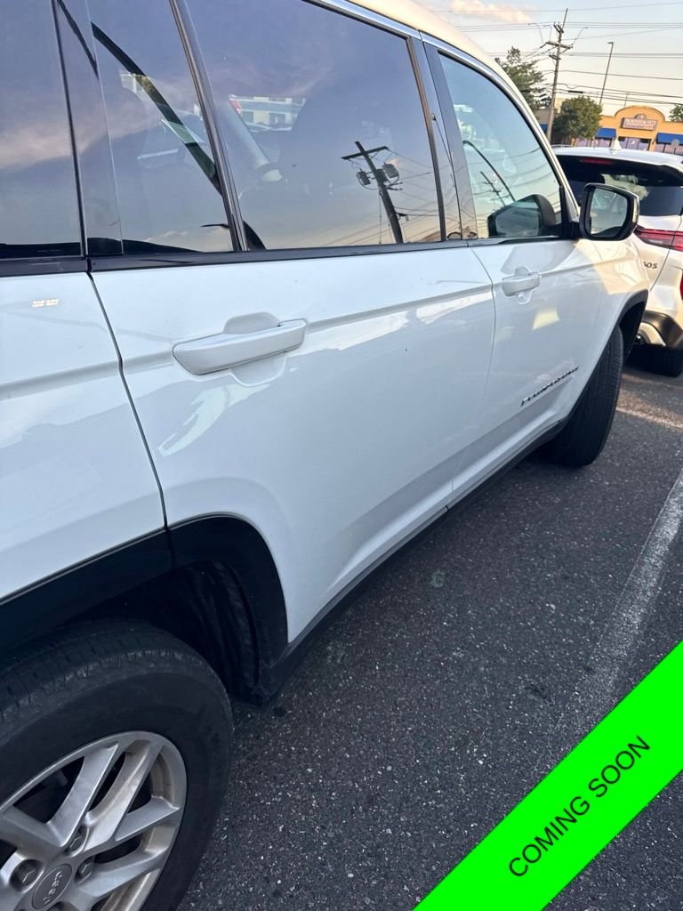 Used 2023 Bright White Clearcoat Jeep Laredo image 1