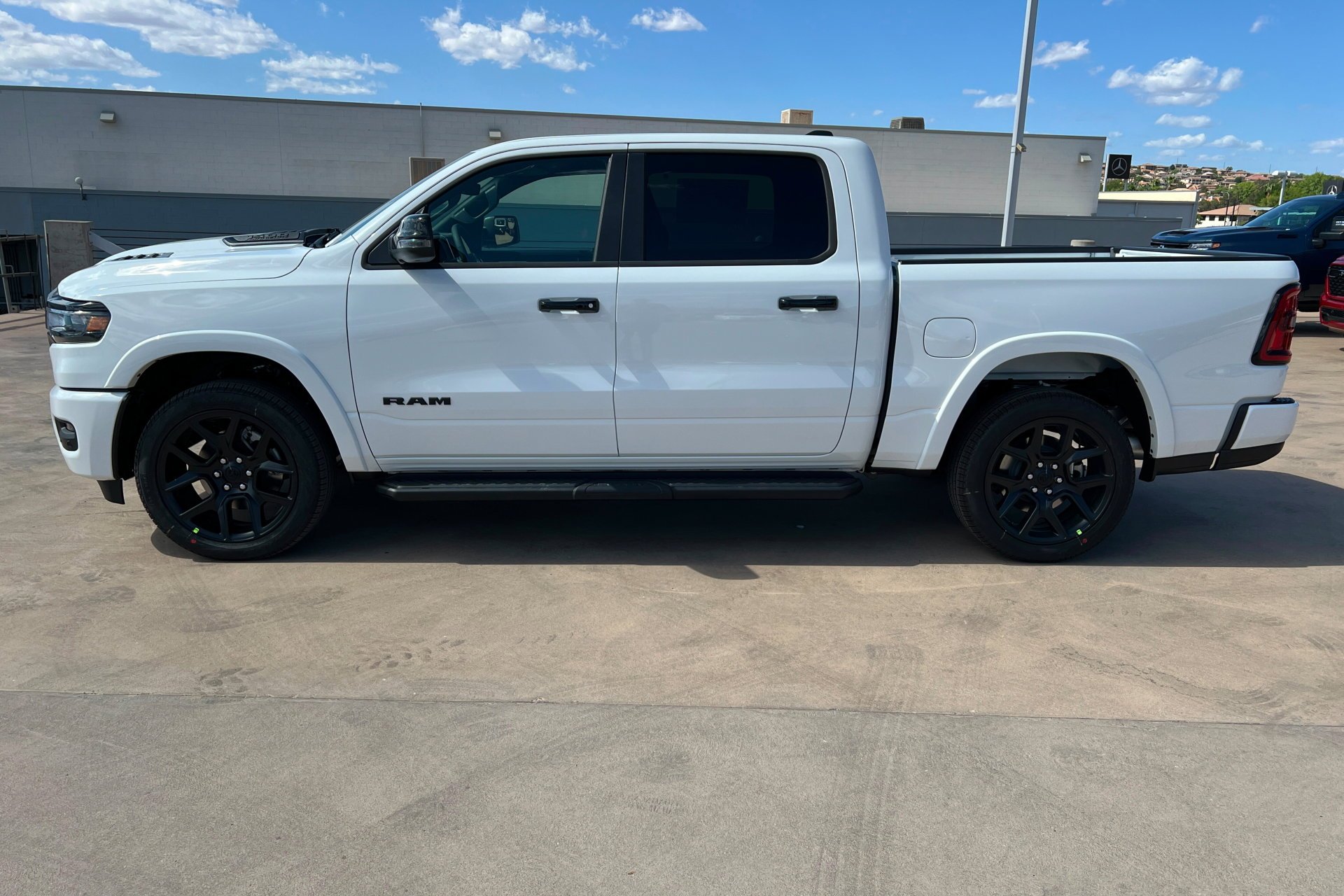 New 2026 Bright White Clear-Coat Exterior Paint RAM Laramie image 2