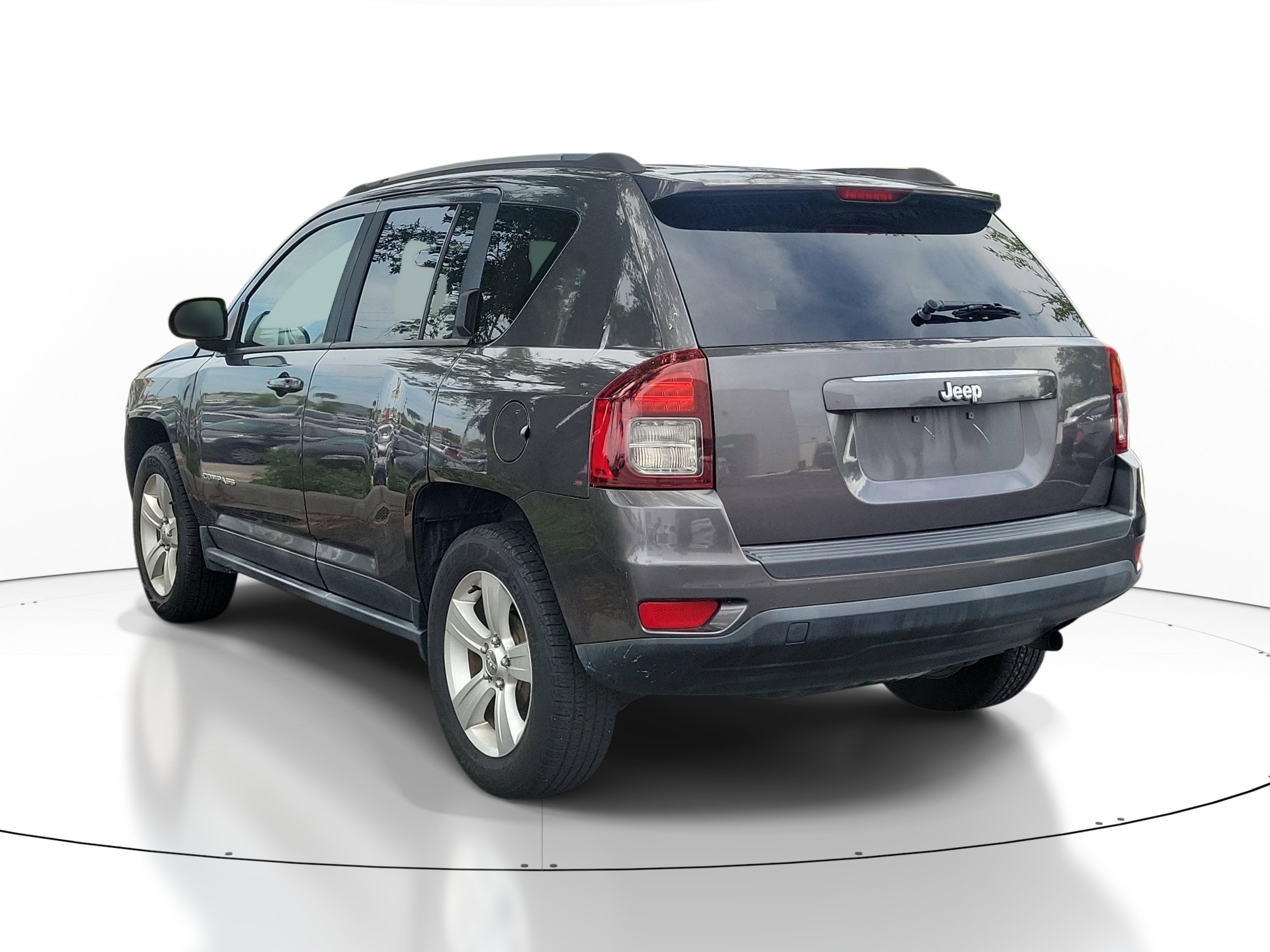 Used 2015 Granite Crystal Metallic Clearcoat Jeep Sport image 8