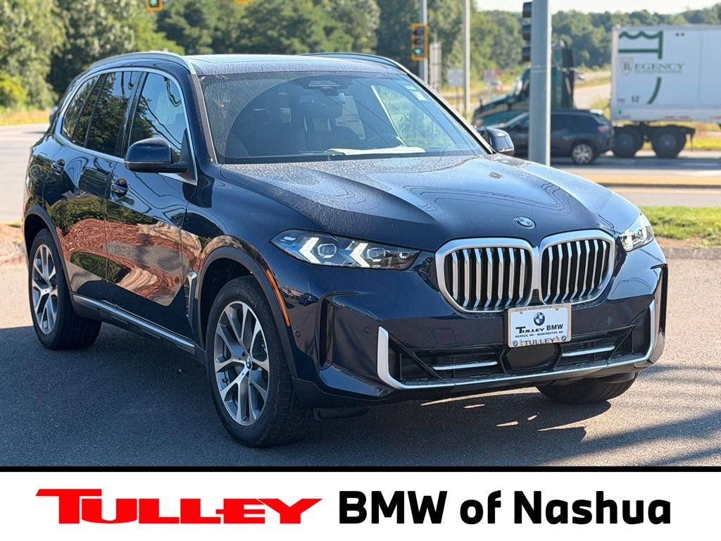 New 2026 Tanzanite Blue II Metallic BMW xDrive40i image 1