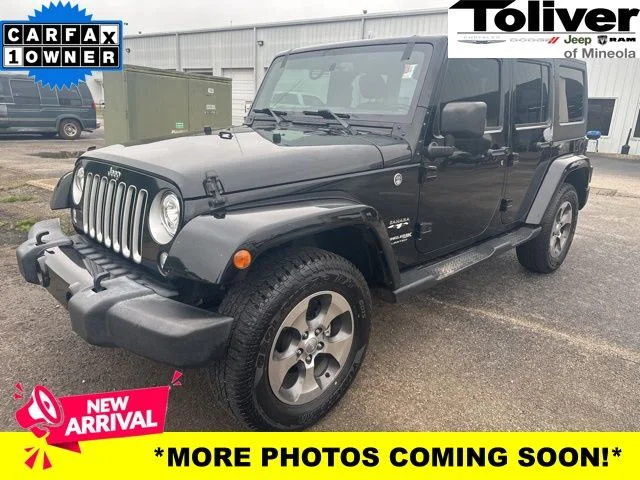 Used 2018 Black Jeep Unlimited Sahara image 1