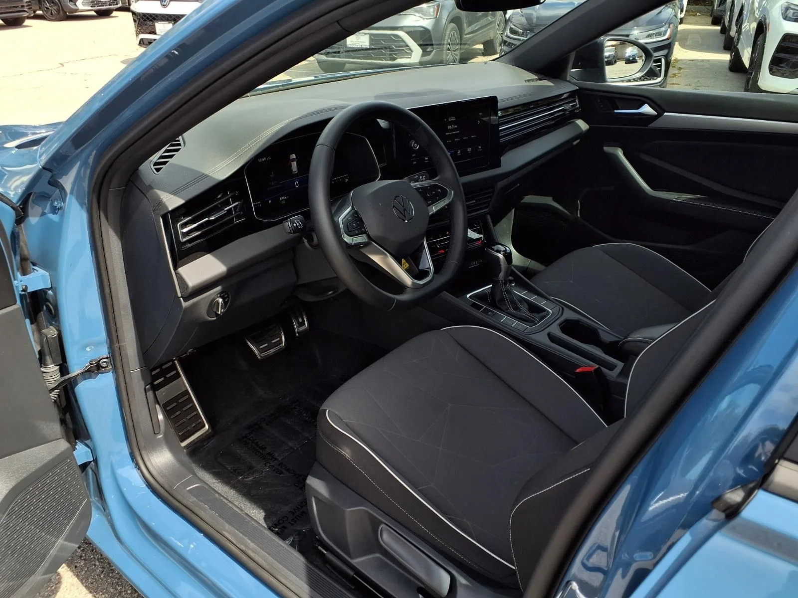 Certified Used 2025 Blue Volkswagen 1.5T Sport image 17