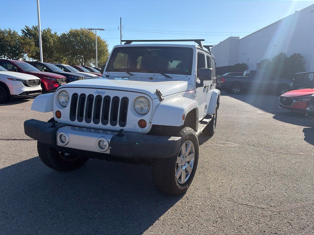 Used 2013 White Jeep Unlimited Sahara image 2