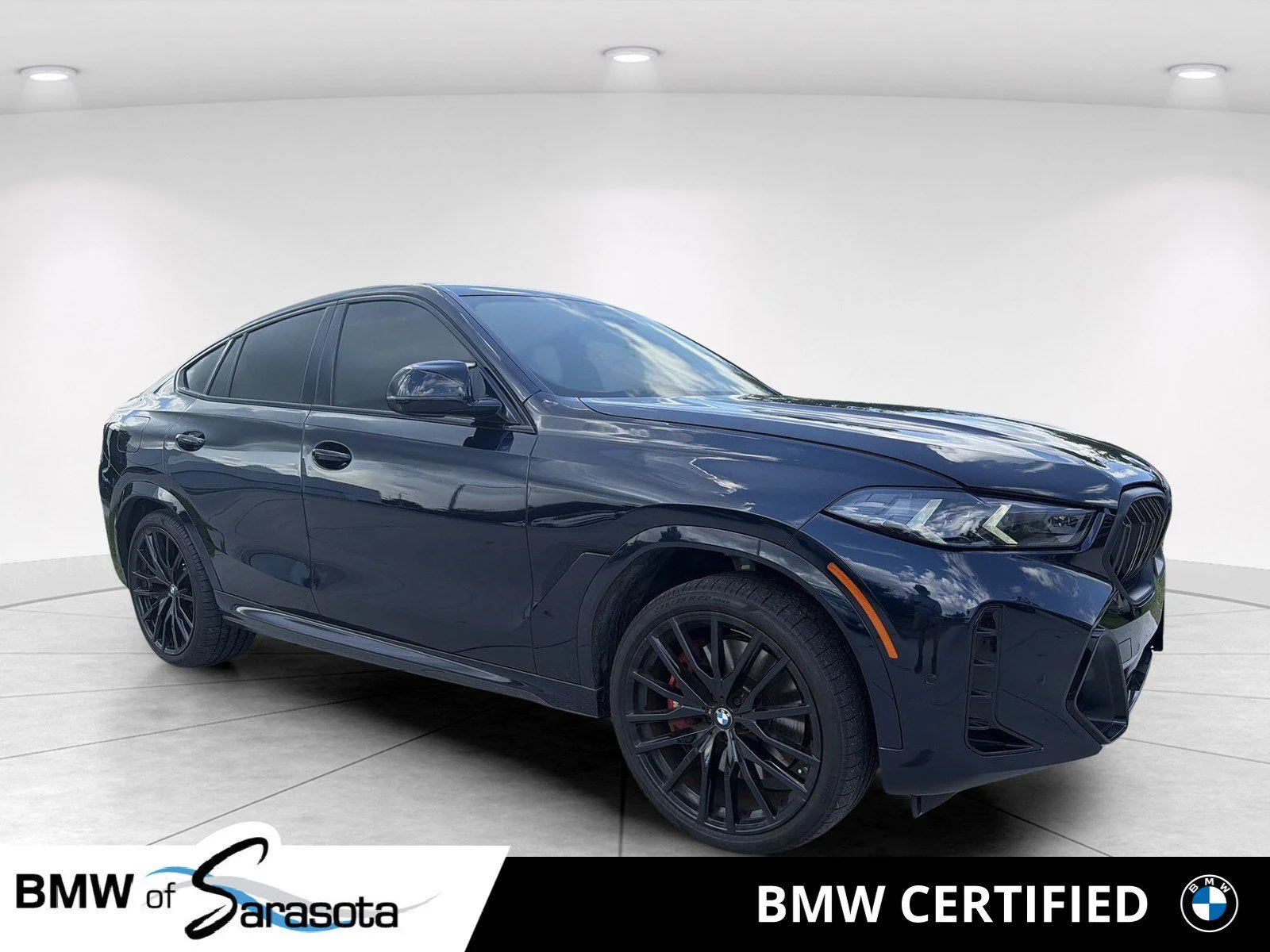 Certified Used 2025 Carbon Black Metallic BMW M60i image 1