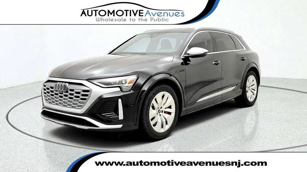 Used 2024 Mythos Black Metallic Audi quattro Premium Plus w/ 19.2 kW Charger & Trailer Hitch image 1