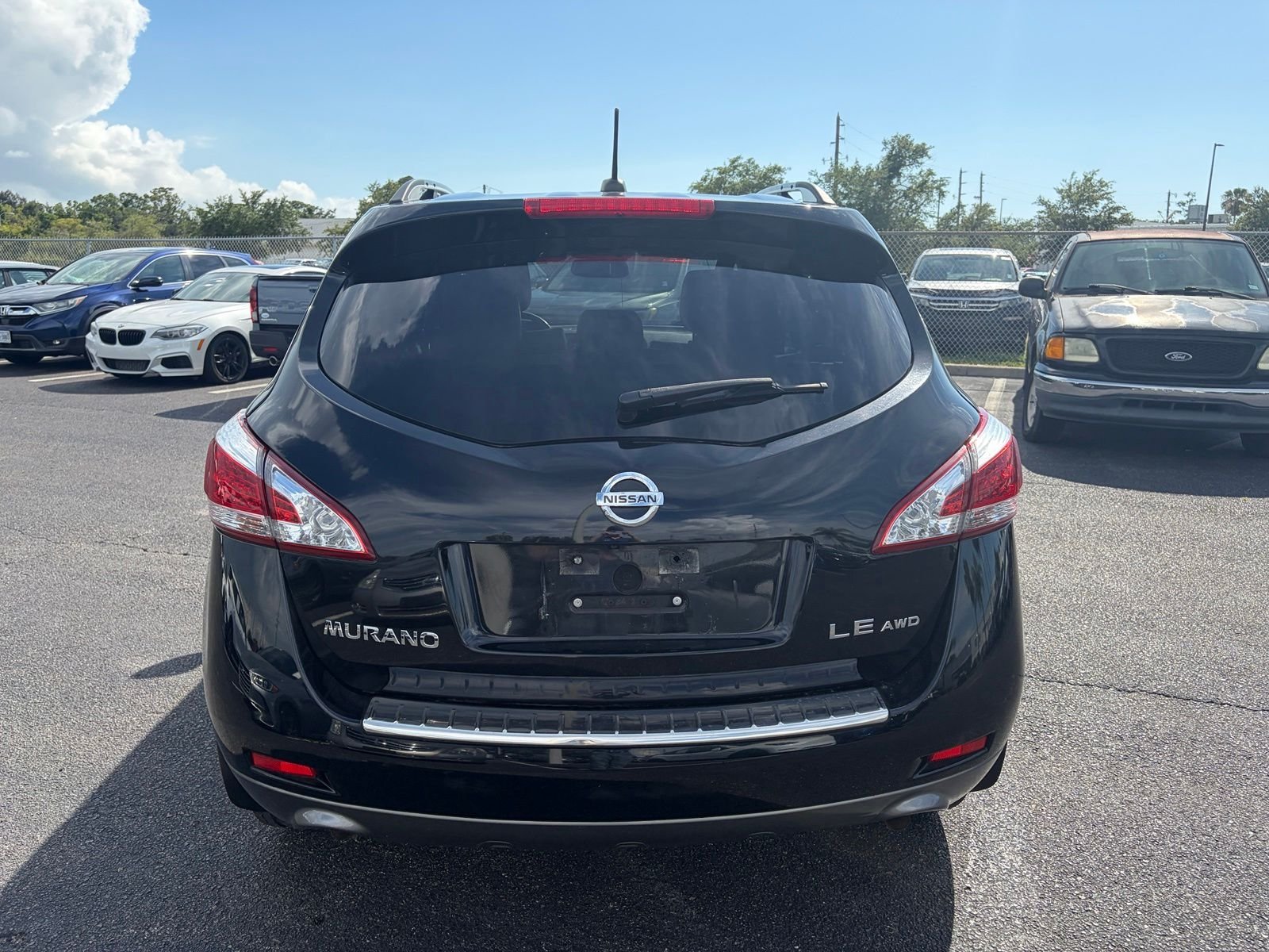 Used 2011 Black Nissan LE image 6