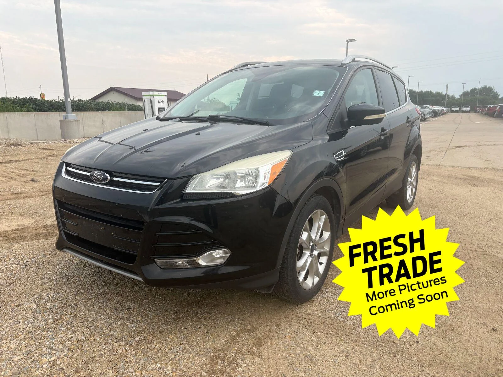 Used 2014 Tuxedo Black Metallic Ford Titanium image 1