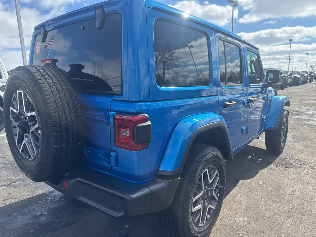 Used 2025 Blue Jeep Sahara image 3