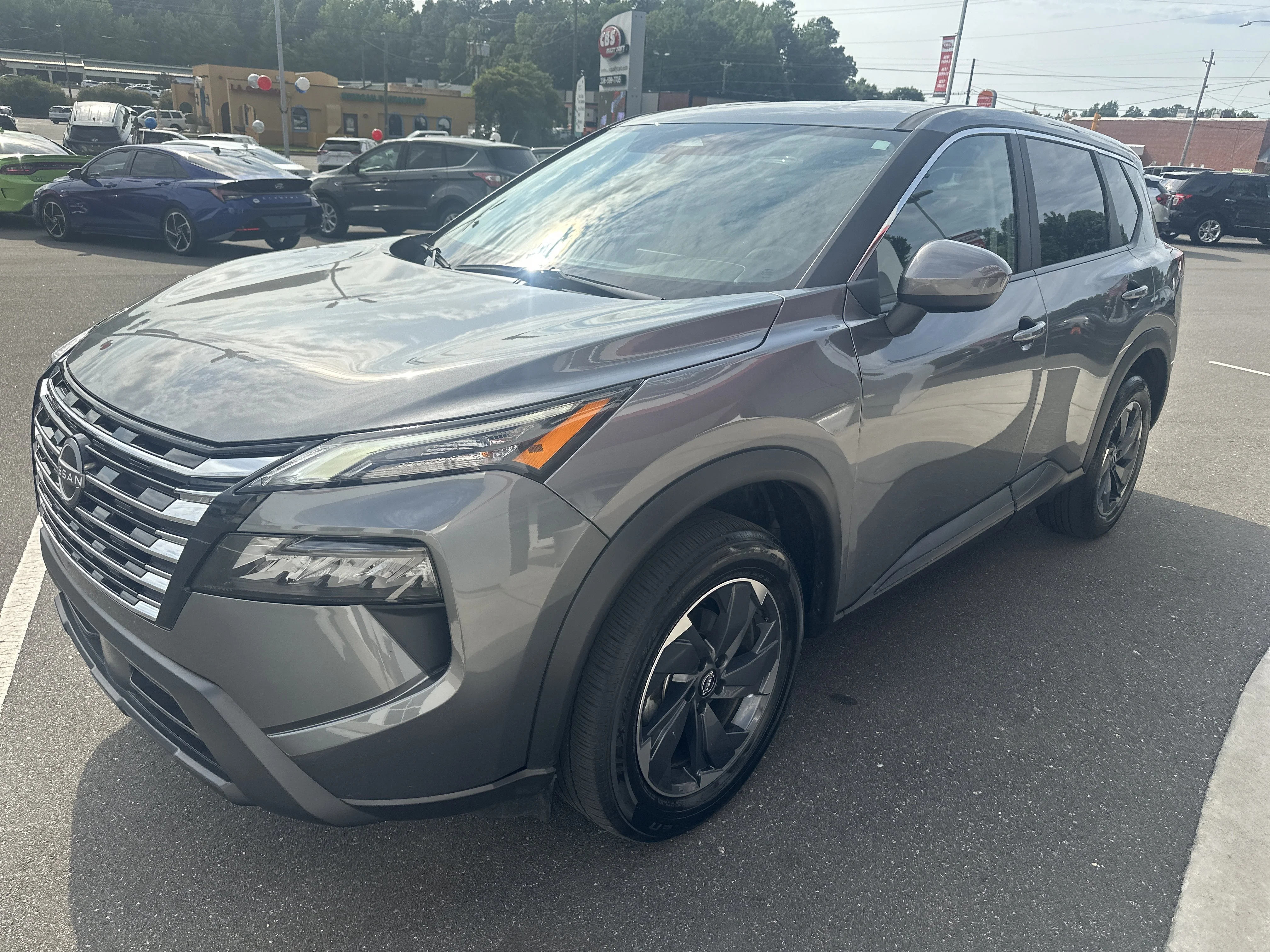 Used 2025 Gun Metallic Nissan SV image 4