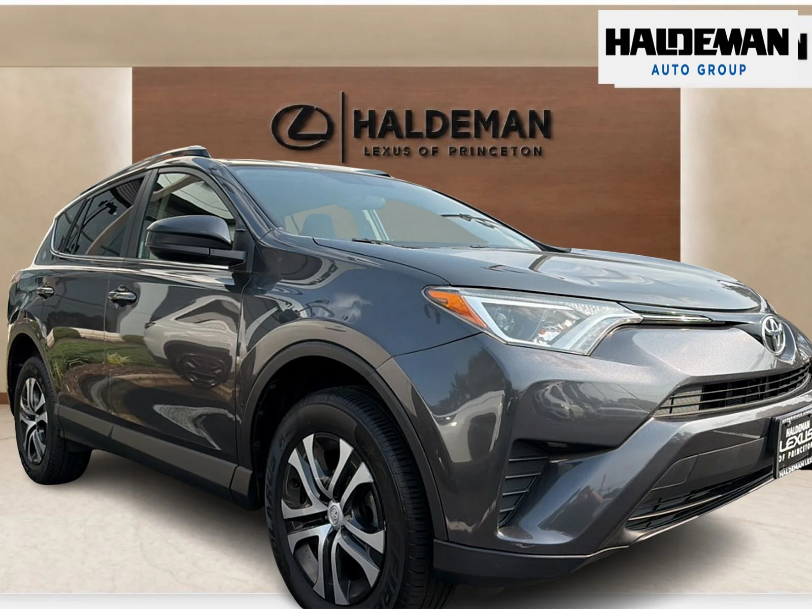 Used 2016 Magnetic Gray Metallic Toyota LE image 1