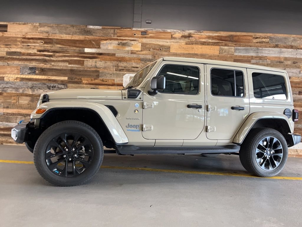 Used 2022 Jeep Wrangler Unlimited Sahara 4XE with VIN 1C4JJXP64NW266727 for sale in Louisville, KY