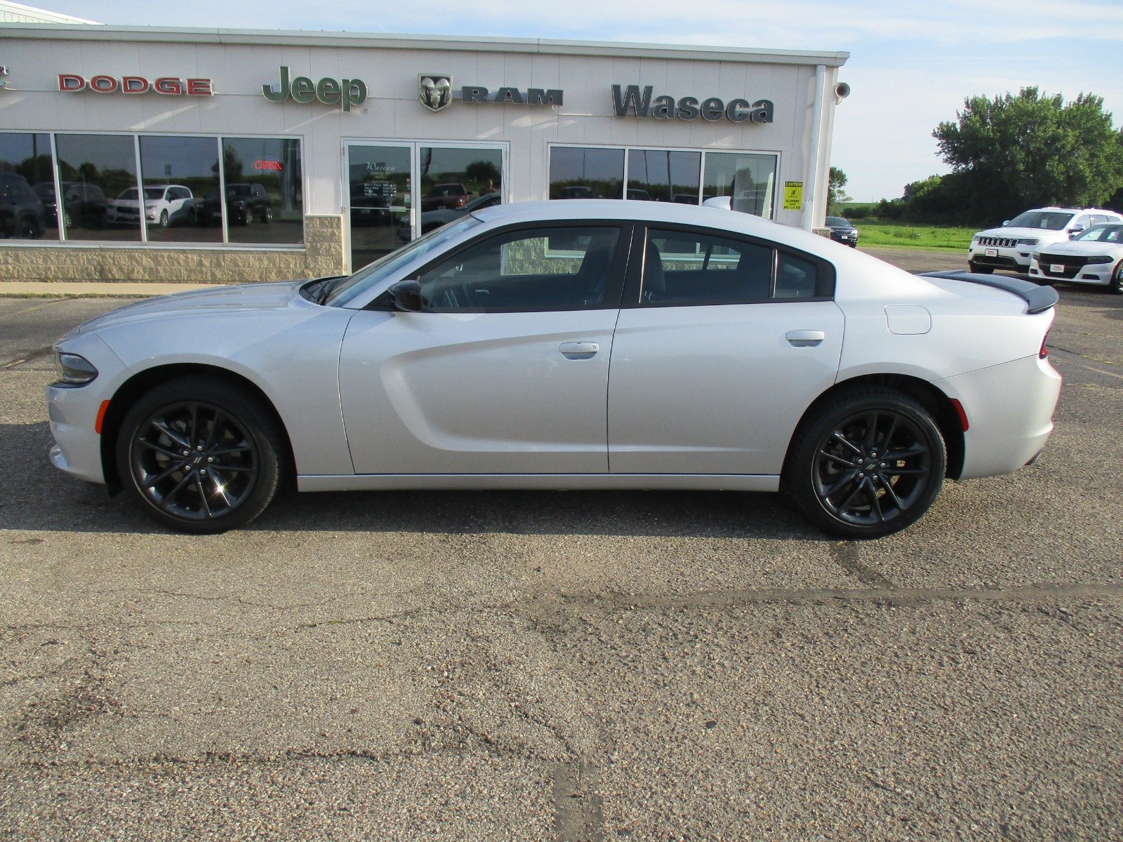 Used 2022 Dodge Charger SXT with VIN 2C3CDXJG3NH241709 for sale in Waseca, Minnesota