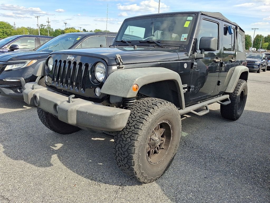 Used 2015 Black Jeep Unlimited Sport image 3