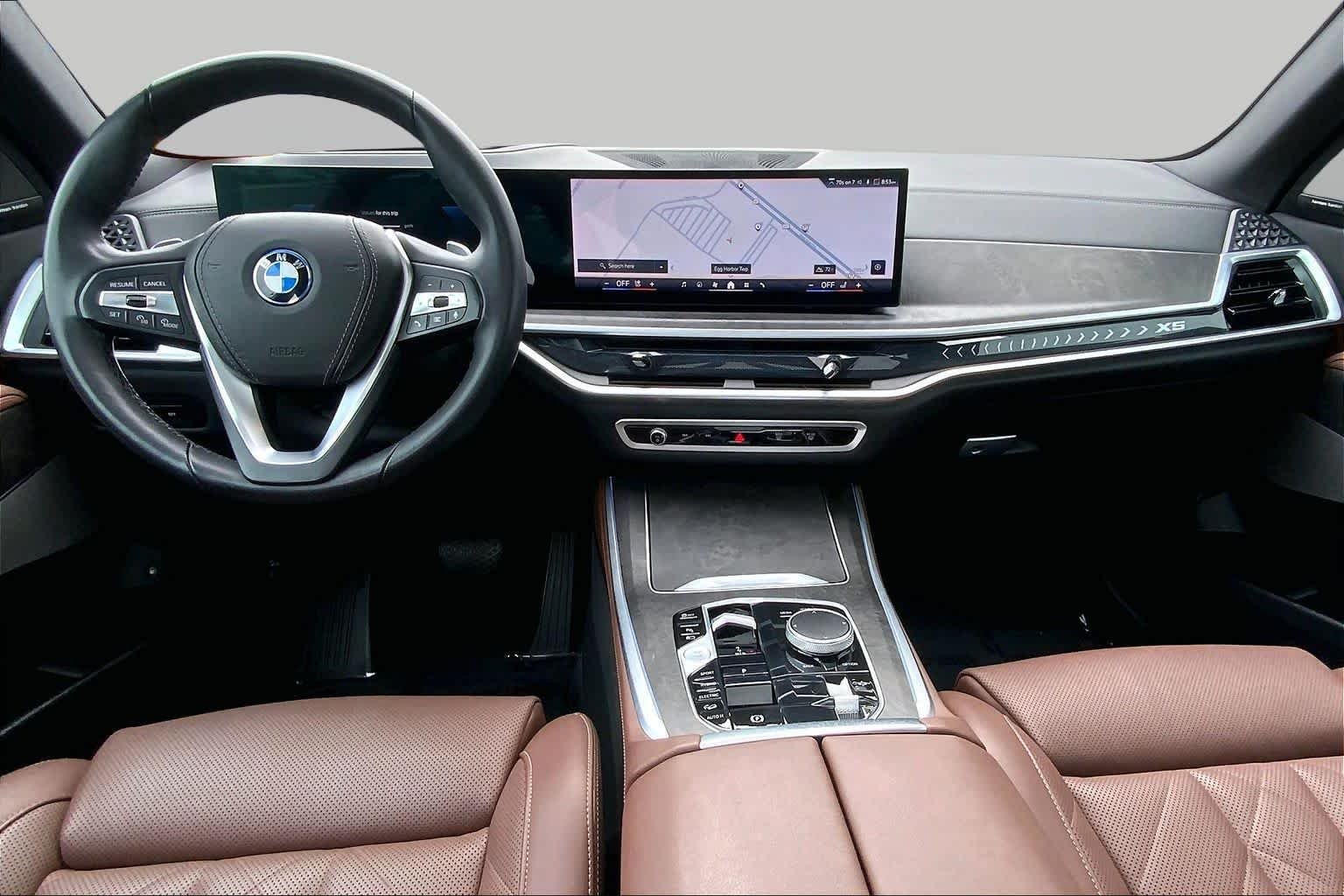 Used 2024 Mineral White Metallic BMW xDrive50e image 15