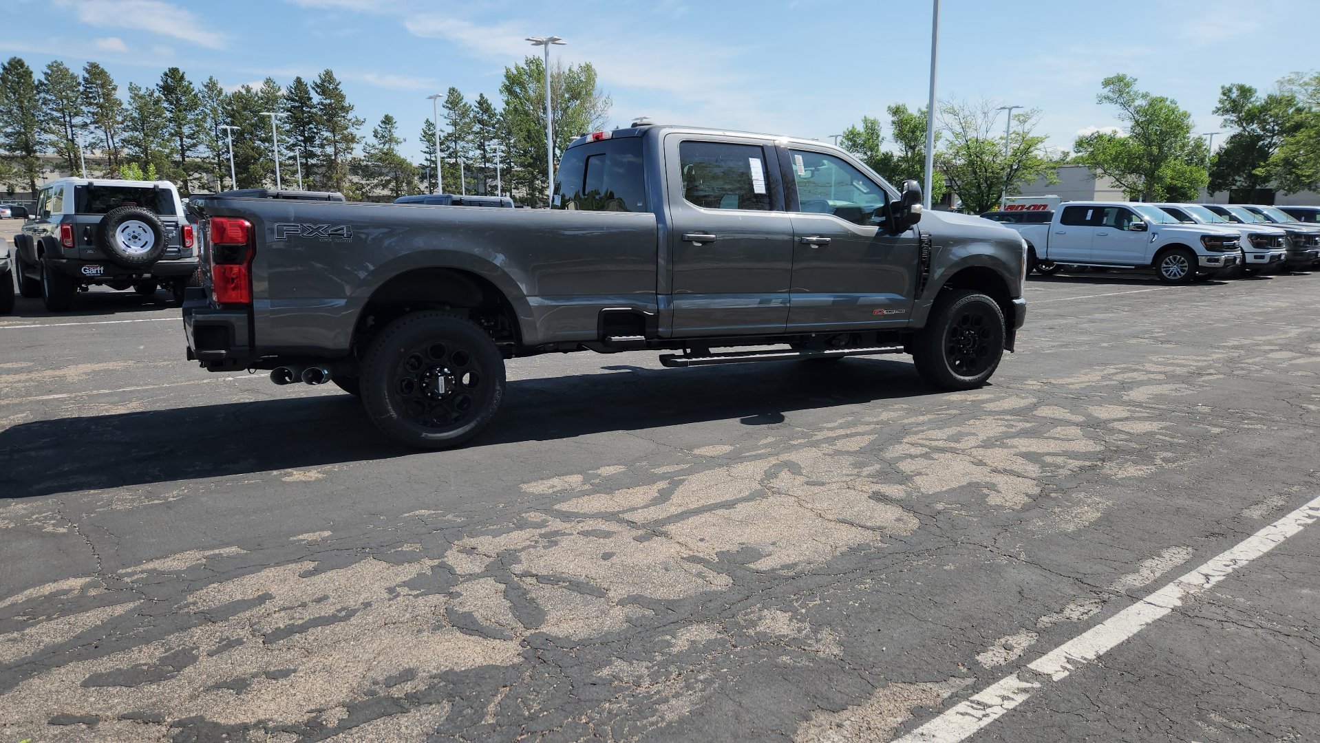 New 2026 Carbonized Gray Metallic Ford LARIAT image 16