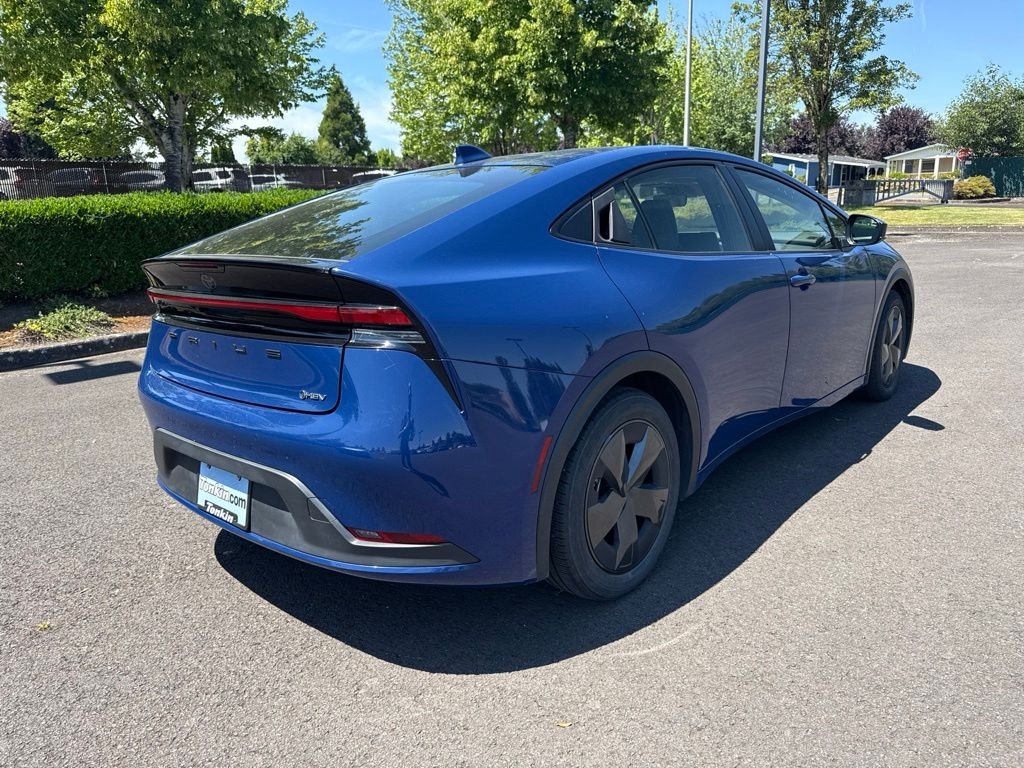 Used 2025 Reservoir Blue Toyota LE image 7