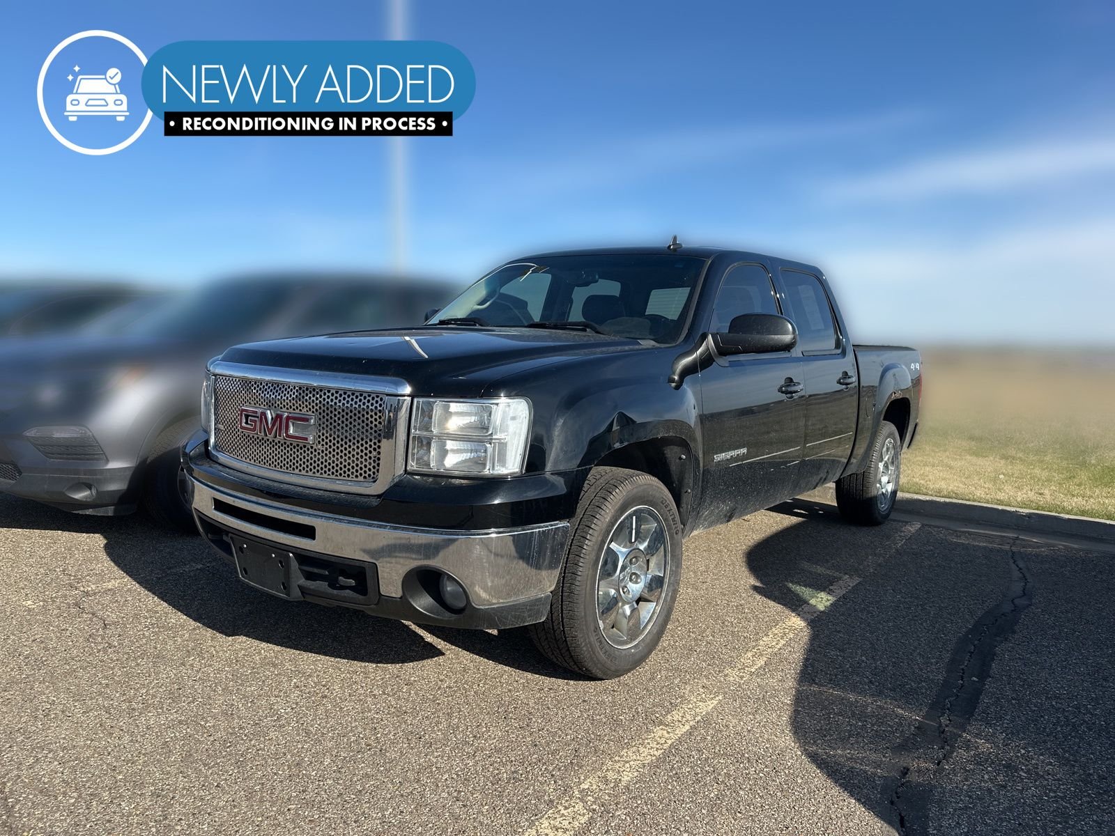 2010 GMC Sierra 4WD Crew Cab SLT SWB's photo