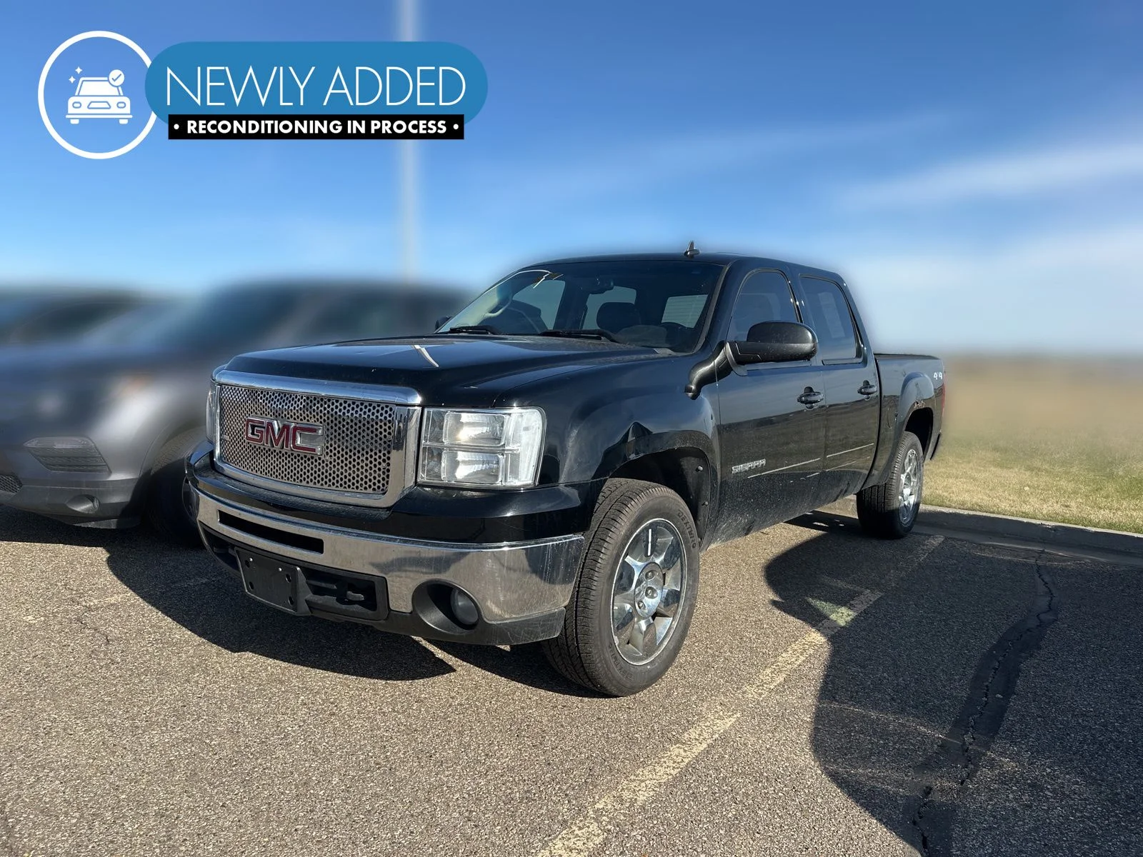 2010 GMC Sierra 4WD Crew Cab SLT SWB's photo