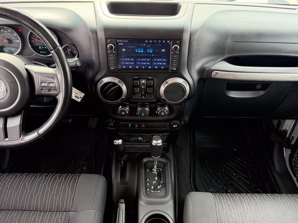 Used 2012 Silver Jeep Unlimited Sport S image 16